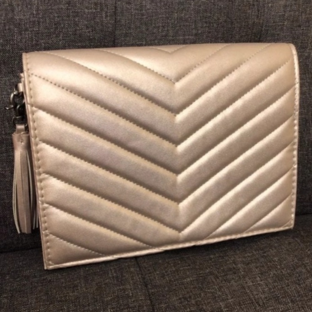 Nieman Marcus Faux leather Metallic clutch.